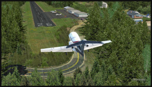 Phenom 100 on short final for runway 26, Sekiu airport, Washington State, USA