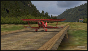 A Texaco WACO aircraft is taxiing on a wooden bridge at Bear Gulch, WA38