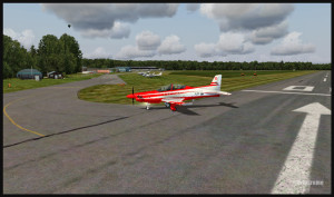 A PC-21 aircraft and the Fairoaks airport, United Kingdom