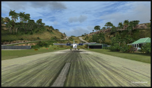 40017 The Twin Otter lands on the threshold of runway 10 at St Barths TFFJ (FSX)