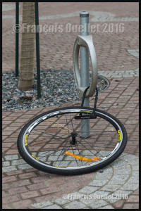 Street photography in Toronto: what's left of a bike that was locked for more security