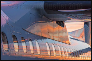 Sunset colors reflecting on an Air Canada Bombardier Q-400 in Toronto