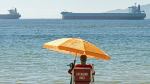 A lifeguard makes sure that the ships keep on floating...