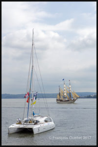 The catamaran Impossible Dream and the vessel Europa arrive in Quebec for the Tall Ships Regatta 2017