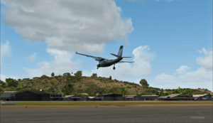 Vitesse-sol de 20 noeuds pour le Shrike Commander 500S en finale pour le hangar de Port Moresby Jacksons (AYPY).