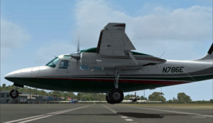 Vue latérale du Shrike Commander 500S en finale pour le hangar à Port Moresby Jacksons.
