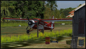 Avion de type Otter stationné sur la piste de Launumu en Papouasie Nouvelle-Guinée.