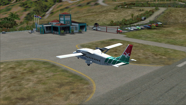 Le Shorts 360 quitte la piste 12 de l'aéroport Juancho E. Yrausquin.