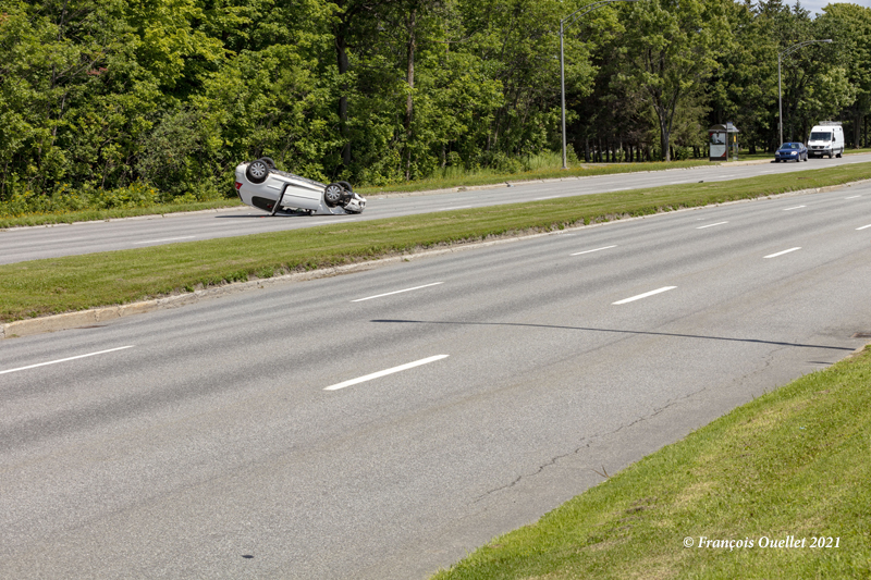 A car turned over on boulevard Laurier in Quebec City.