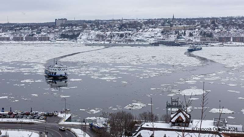 Two ferries across the ice in front of Quebec City and Lévis winter 2024