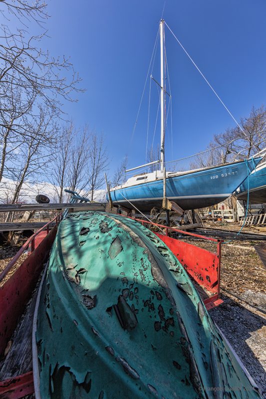 A boat requires repainting on île d'Orléans, Spring 2024.