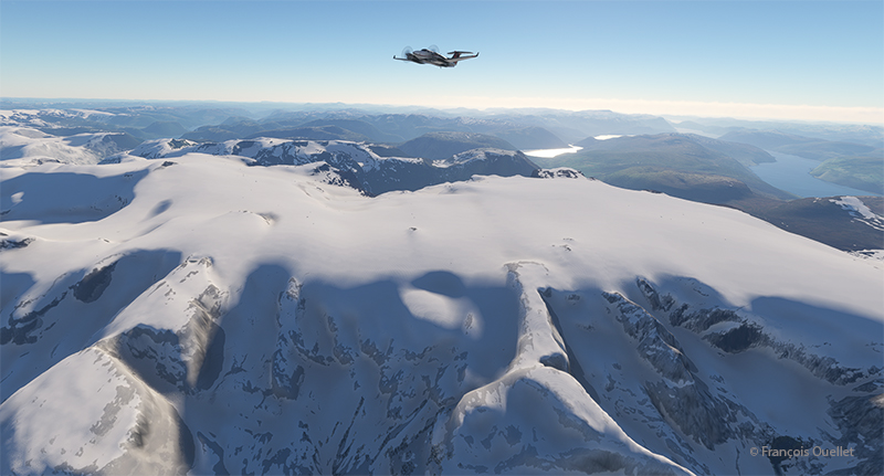 Au-dessus des cimes enneigées de Norvège, en route pour la Suède en simulation de vol.