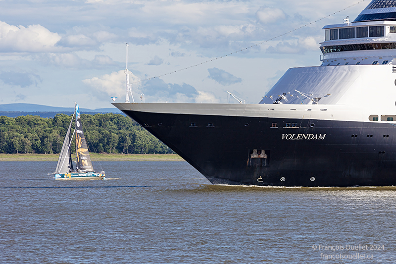 The Martinique Tchalian sailboat and the Volendam during the Transat Québec Saint-Malo 2024