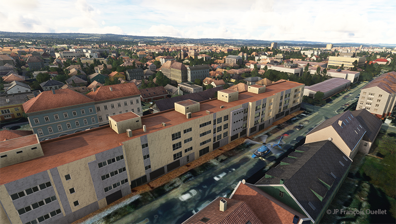 Hélicoptère H160 en descente au-dessus de la Münchhausenstrasse à Göttingen en Allemagne, en simulation de vol.