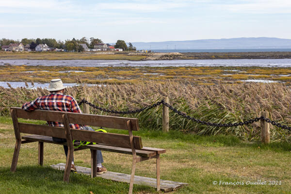 Old man relaxing at L'Isle-aux-Coudres.