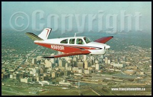 Beechcraft-P35-N9899R-with-passengers-over-Dallas-Texas-on-aviation-postcard-web        