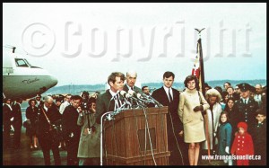 Bobby-Kennedy-and-the-Kennedy-family-plane-The-Caroline-on-aviation-postcard-web        